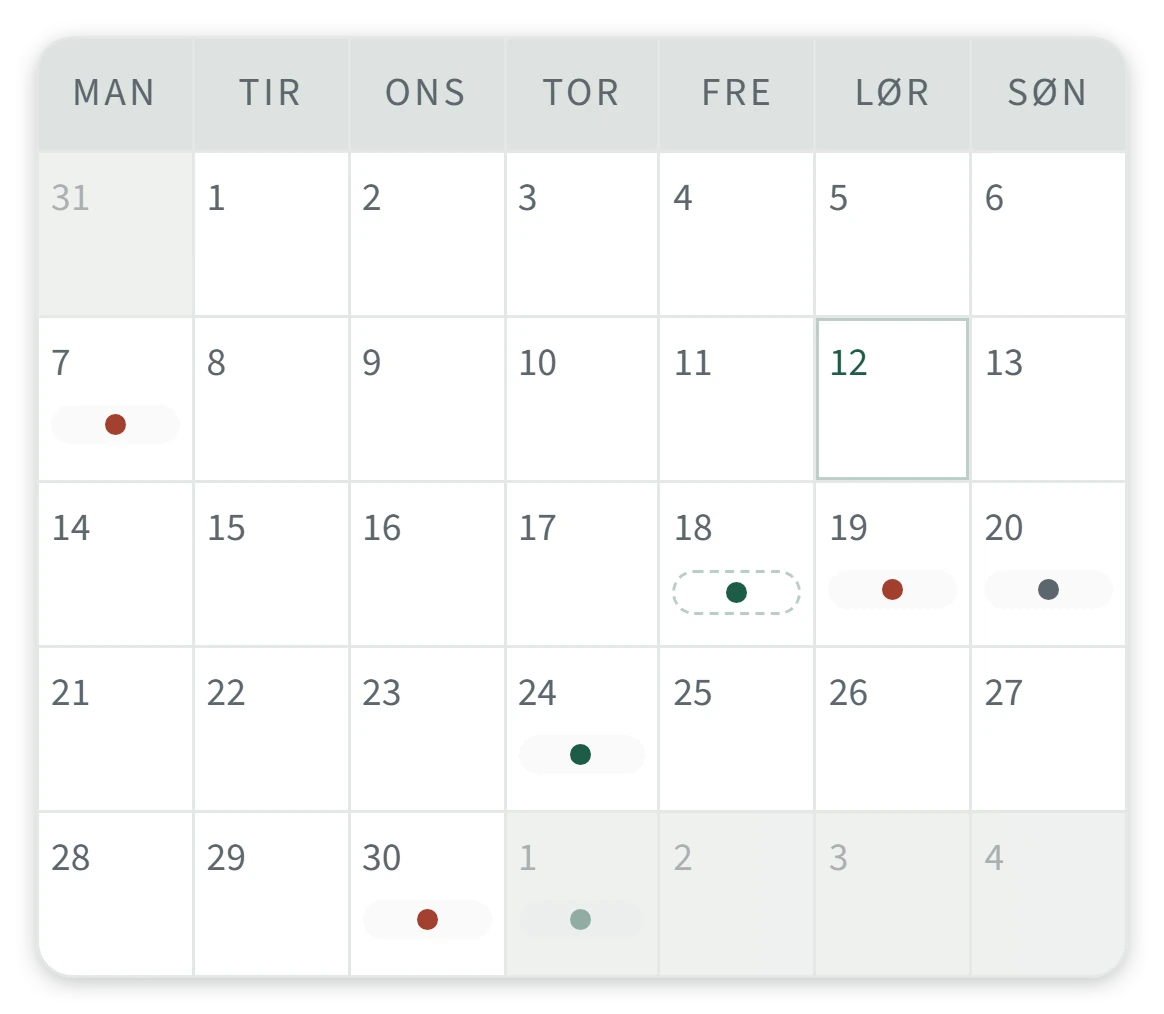 Månedsvisningen i Ejendomsdrifts kalender for september med farvede prikker på de dage, hvor en frist eller en aftale ligger.